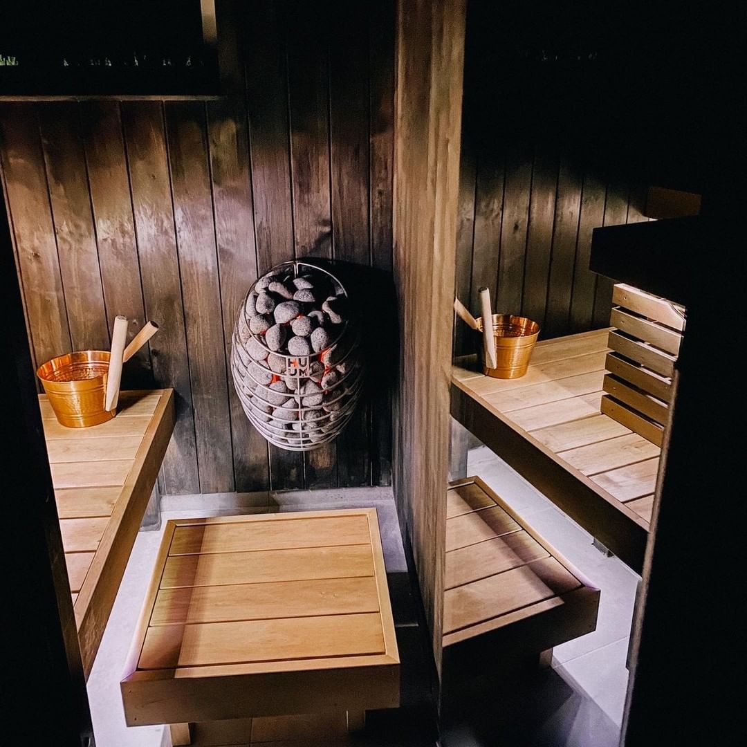HUUM DROP heater in a sauna room